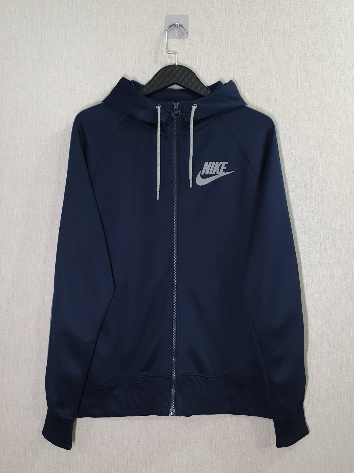 Nike zip-up track jacket with a hood