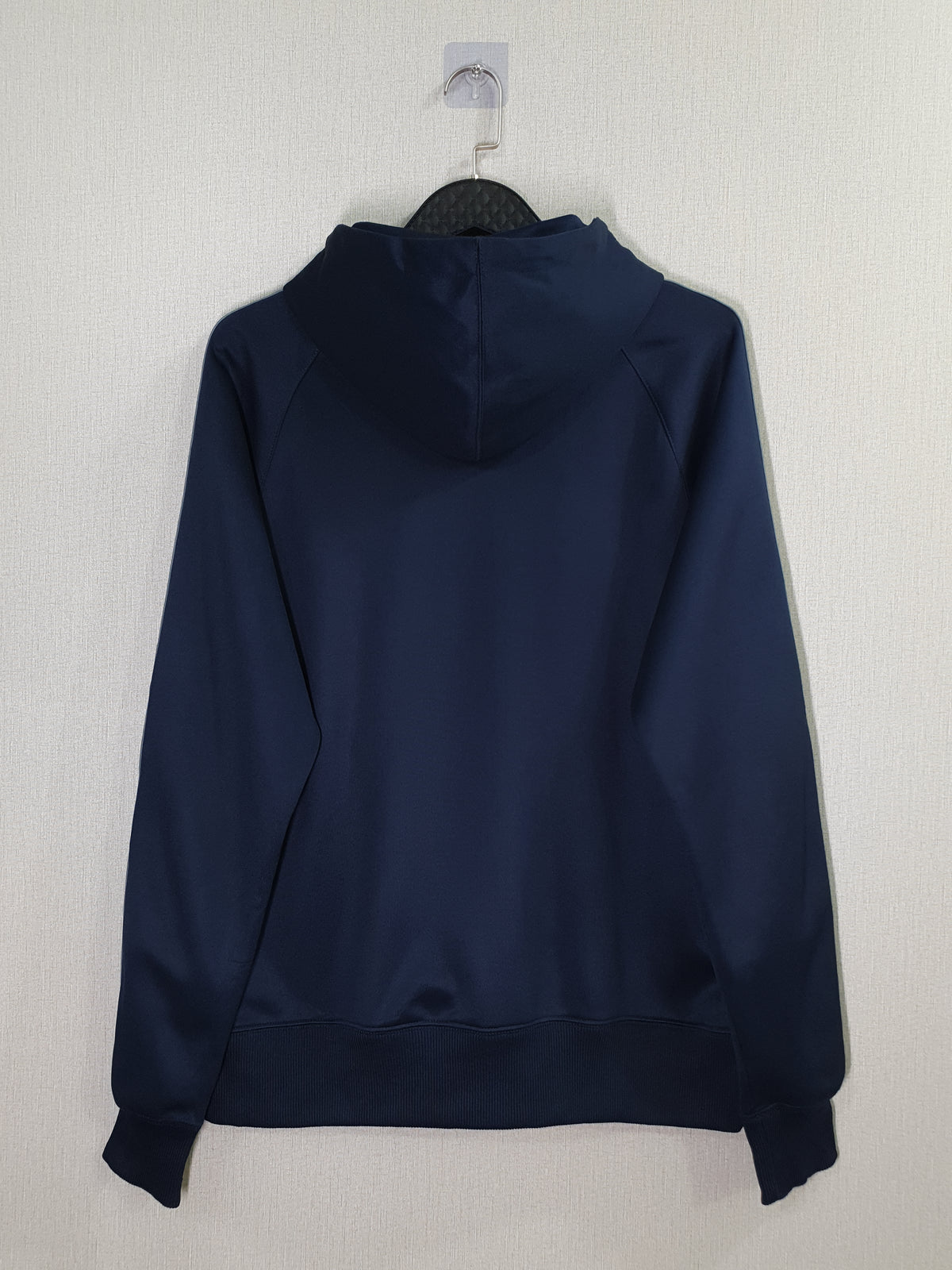 Nike zip-up track jacket with a hood